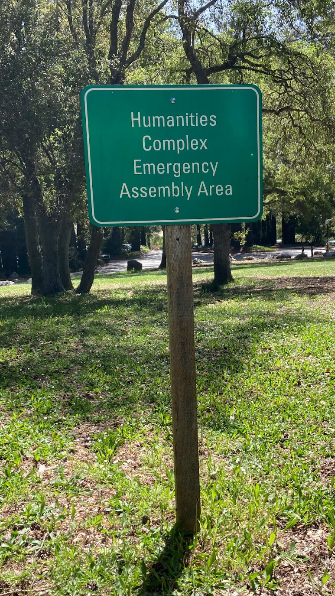 Humanities complex emergency assembly area sign